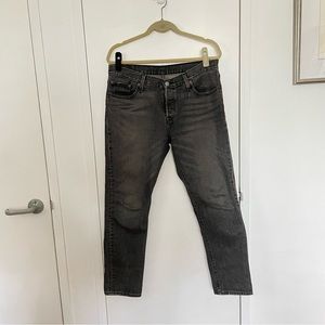 Faded black Levi’s 501 CT jeans